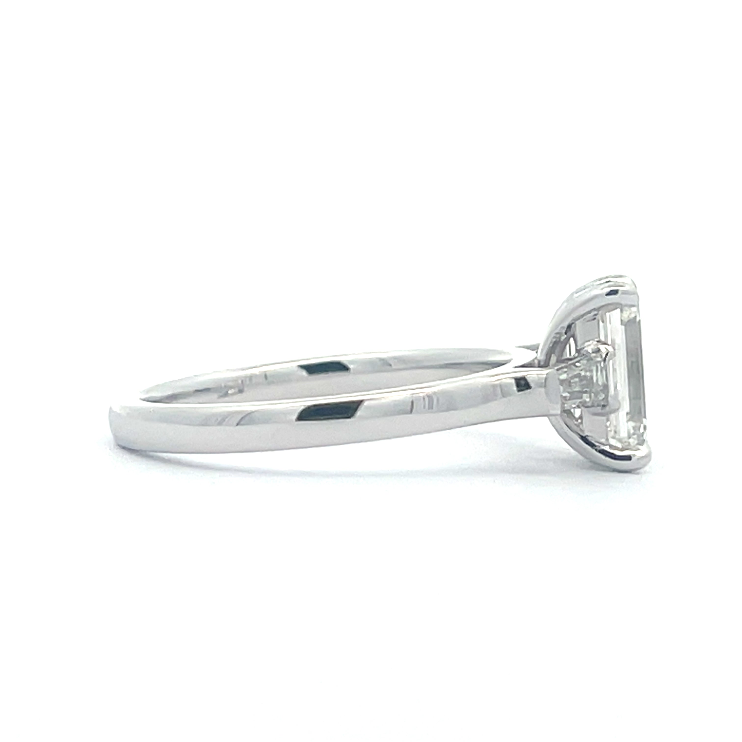 Elegant Emerald Cut Diamond with tapered baguettes Ring