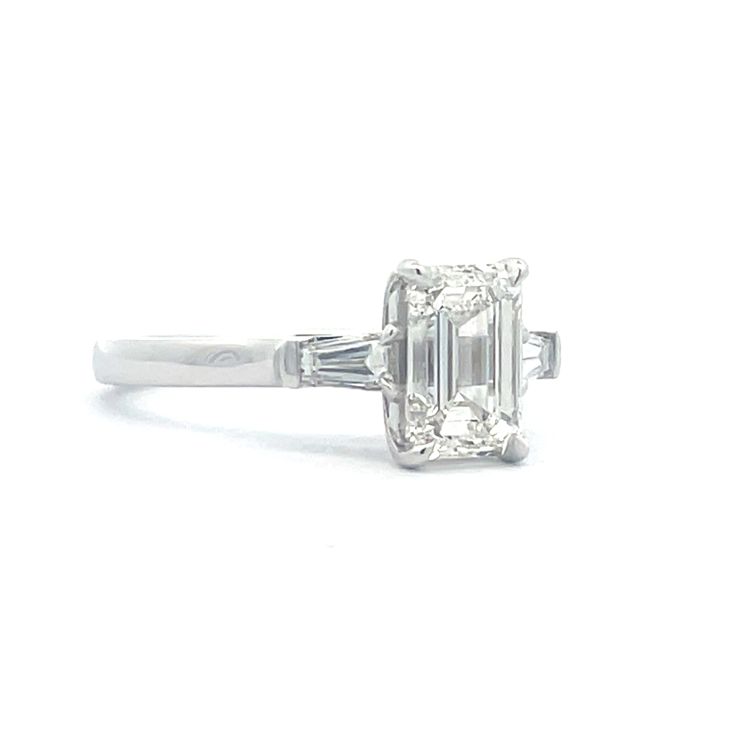 Elegant Emerald Cut Diamond with tapered baguettes Ring