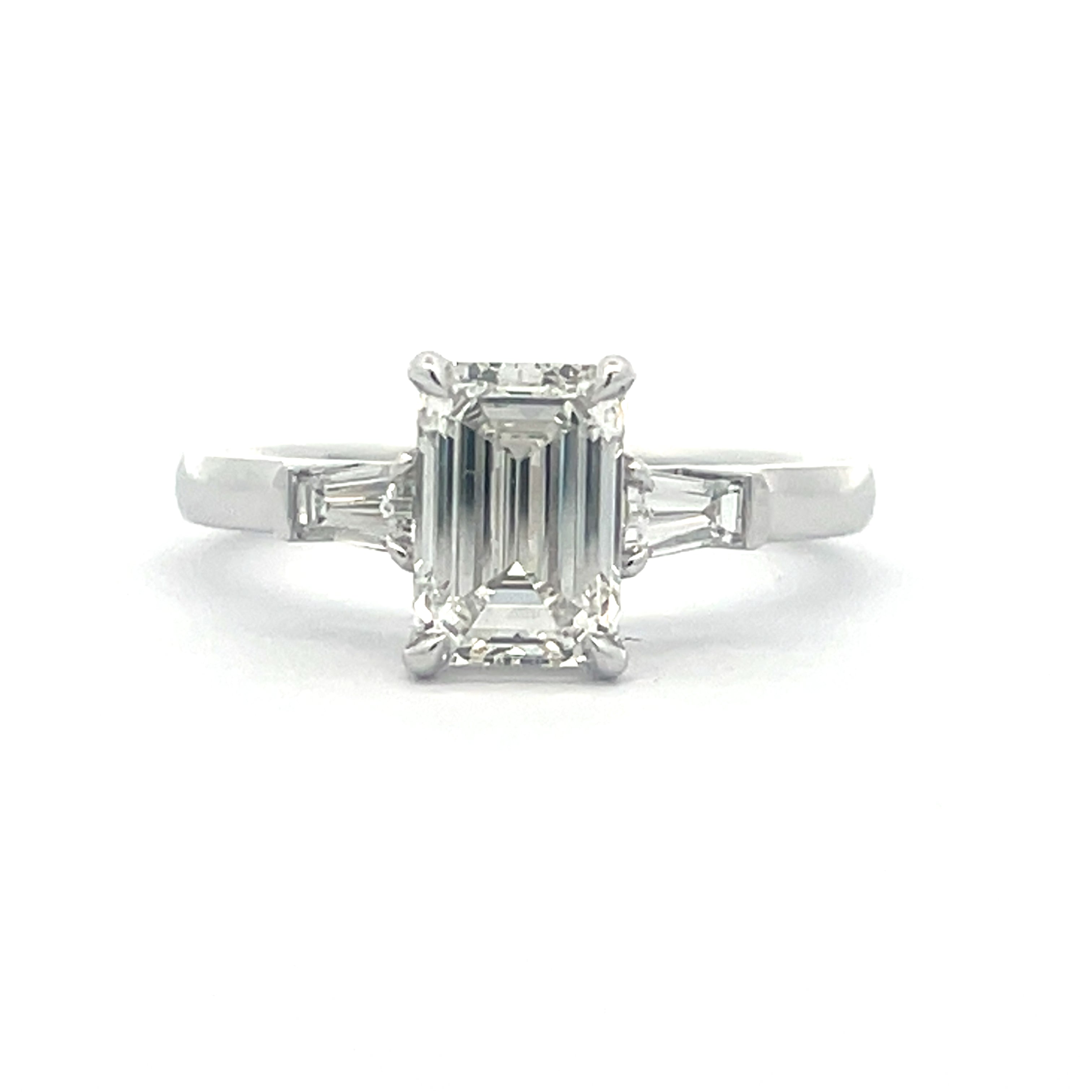 Elegant Emerald Cut Diamond with tapered baguettes Ring
